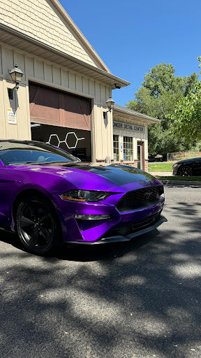 Transform Your Ride: The Stunning Custom Black Vinyl Wrap on a Ford Mustang by TRON Auto Lab Draper